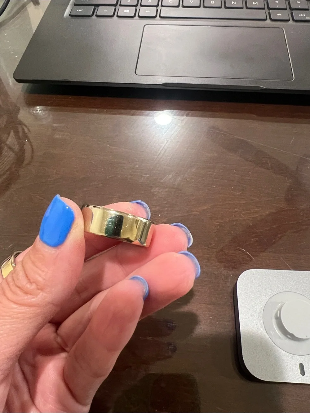 Oura 4 Gold Ring and Charger Dock